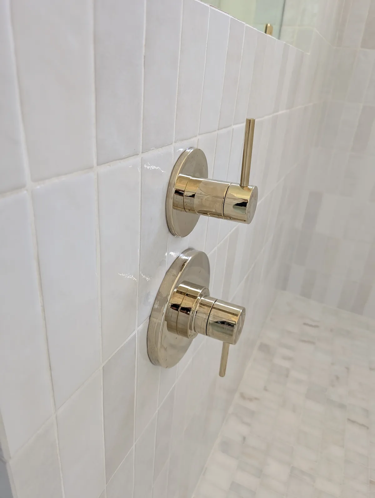 Polished brass shower valve trim closeup, Prescott bathroom finish